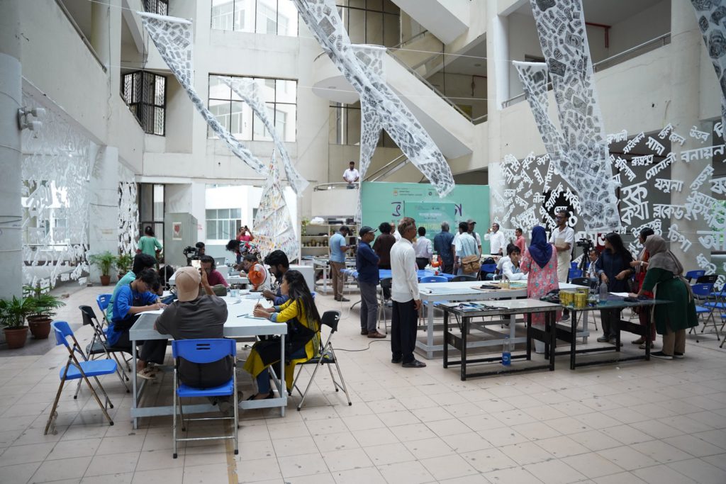 A printmaking session in progress at Shunno